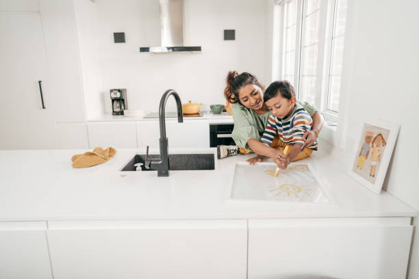 istock Child drawing in the kitchen 1311195898