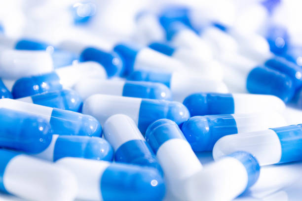 istock Tablets on a plate. Medicine for the patient on a spoon. Tablet on a spoon. 1311198649