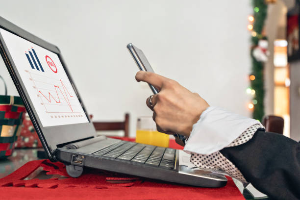 istock Female disabled professional student using laptop at desk, close up view 1311198651