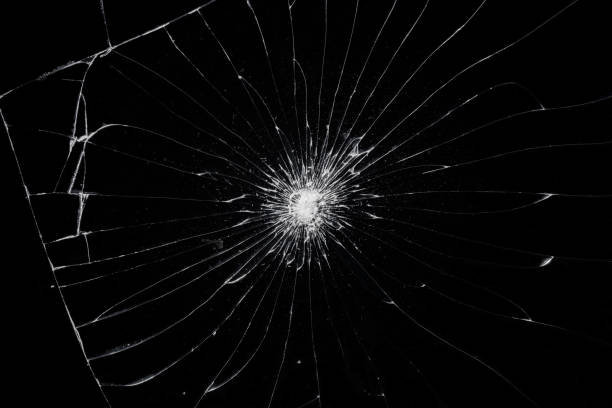 istock Broken glass dark background texture, Cracked touch screen phone. 1311201909
