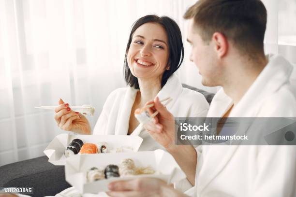 Couple Have A Breakfast At Home At The Morning Stock Photo - Download Image Now - Couple - Relationship, Eating, Sushi