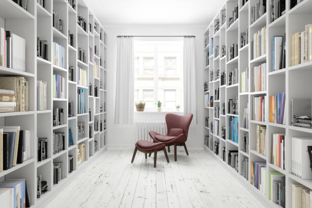 図書館の革製アームチェアまたは棚に本がある読書室で - apartment row house comfortable house ストックフォトと画像