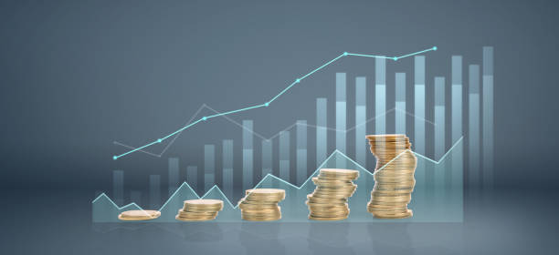 istock Graph stock market. Coins on stacks. investment and saving concept 1311207111