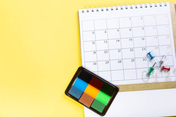 istock White blank 2021 calendar on solid yellow background with copy space, business meeting schedule, travel planning or project stage and reminder concept. 1311214807