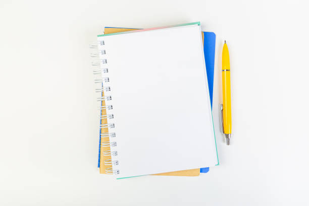 istock top view of open notebook with pen on gray background, school notebooks with coil spring, office notebook flat lay 1311214846