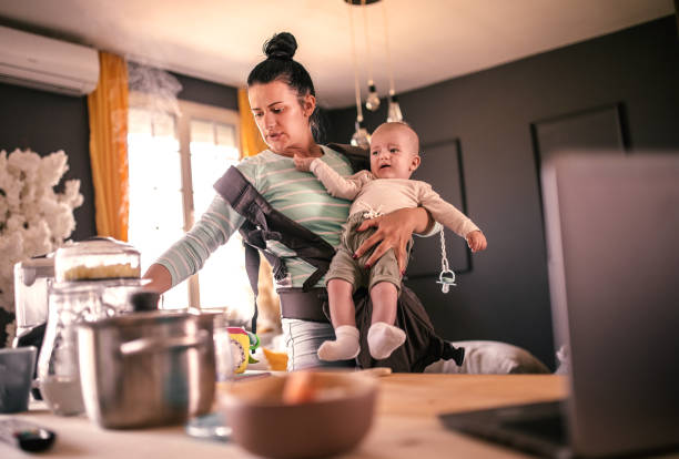 istock Multi generation family with  small baby  preparing food. 1311217641