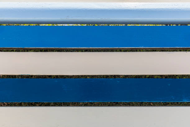 Texture of colored planks of a bench