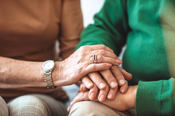 istock Elderly couple holding hands. 1311218989