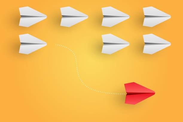 Individuality concept. Individual and unique leader red paper plane flies to the side. Vector vector art illustration