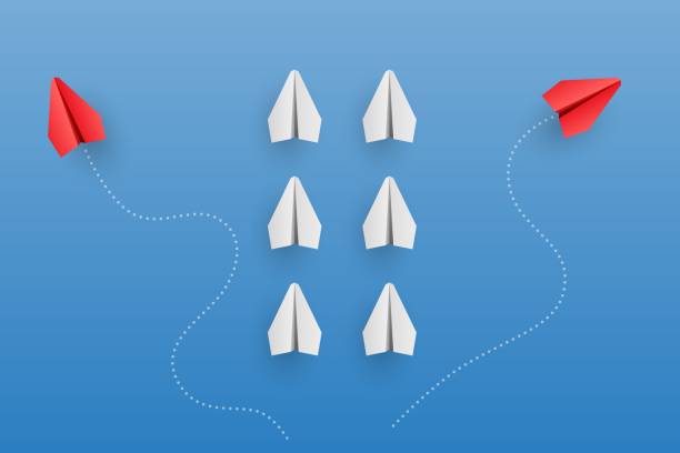 istock Individuality concept. Individual and unique leader red paper plane flies to the side. Vector 1311221073