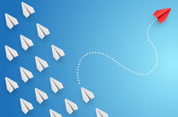 istock Individuality concept. Individual and unique leader red paper plane flies to the side. Vector 1311221086