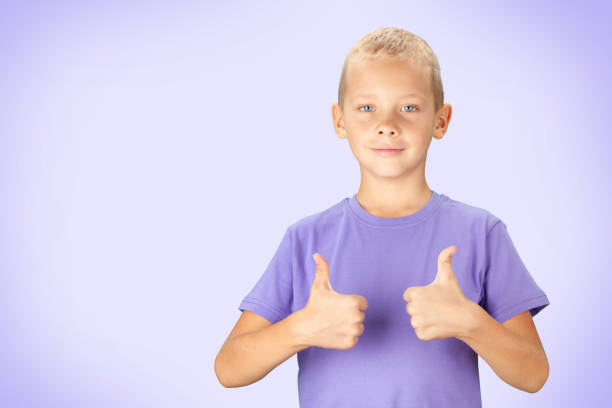 istock Funny boy showing thumbs up 1311221281