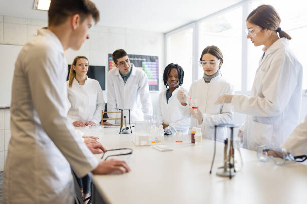 istock Group of High school students in chemistry class 1311230762