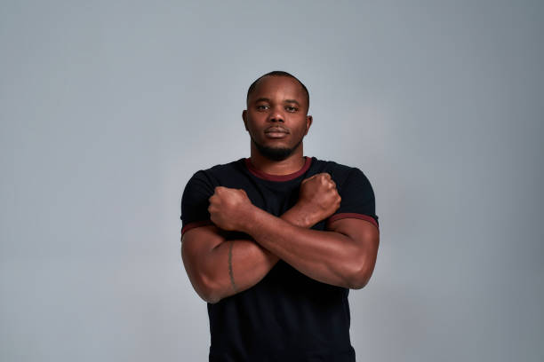 istock Young african american man with crossed hands on chest 1311231500