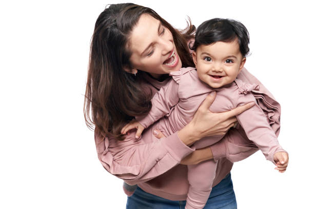 istock Mother and baby daughter having fun. 1311231720