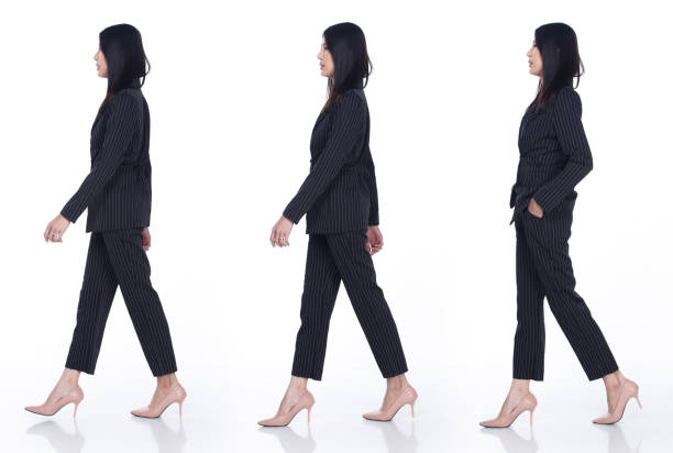 Business Female walks direction forward and smart poses full length