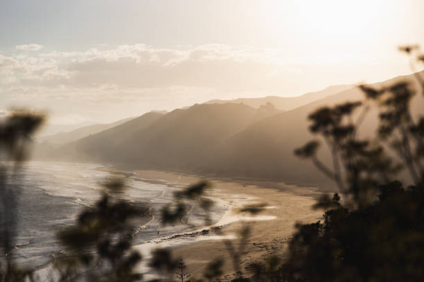 Sunset setting behind the hills at Makorori beach in Gisborne, Aotearoa.