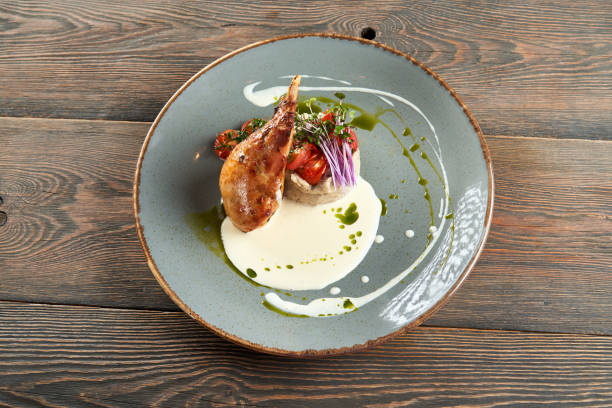 istock Chicken leg served with mashed potatoes and sour cream. 1311237102