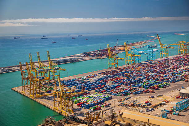 Mediterranean and european city Barcelona and a view over the Harbor with lots of cargo. Industrial