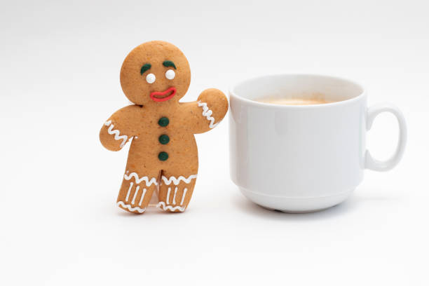 Gingerbread classic decorated cookie with cup of coffee.