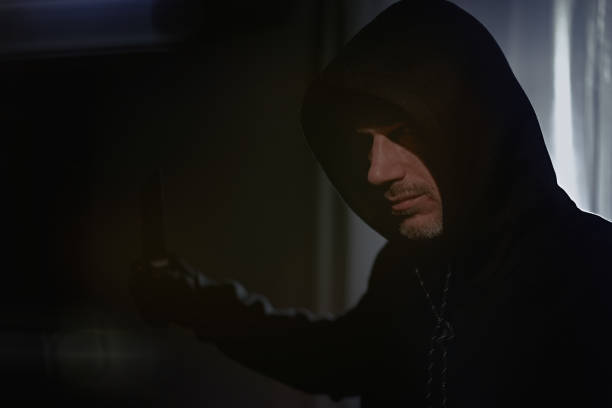 istock Man with a bloody knife 1311242269