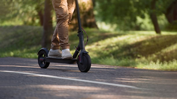 istock Senior riding electric an scooter 1311242288