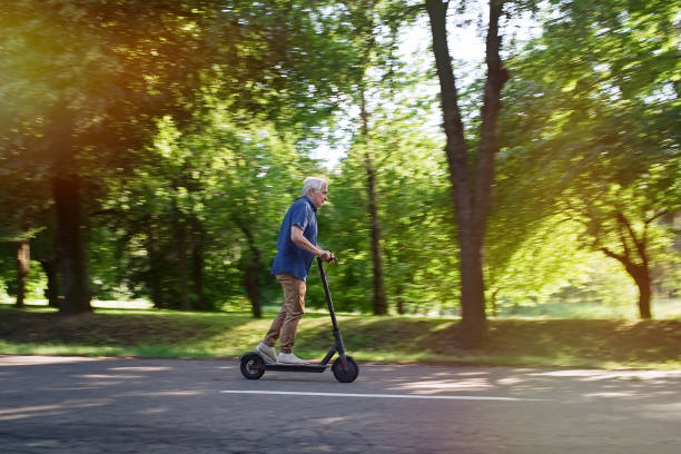 istock Senior riding electric an scooter 1311242298