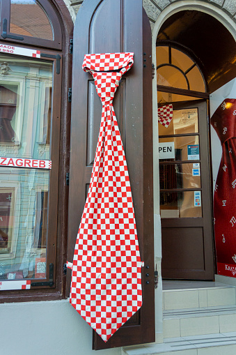 Large red and white checked tie on display in the city of Zagreb, Croatia