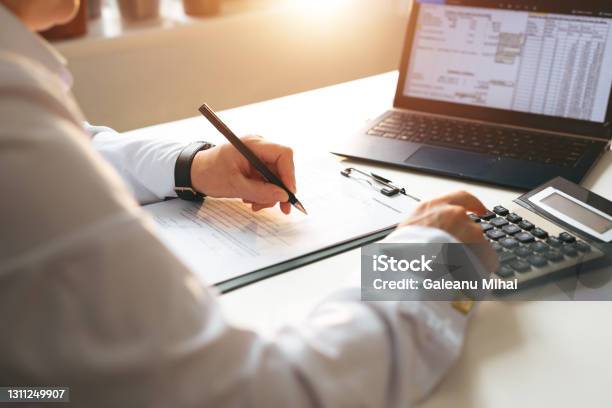 Businessman Calculating The Financial Statement Of His Business Business Panoramic Banner With Copy Space Accounting And Tax Stock Photo - Download Image Now