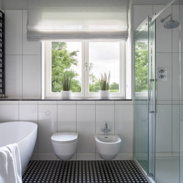 istock Spacious bathroom with bathtub and shower 1311250503