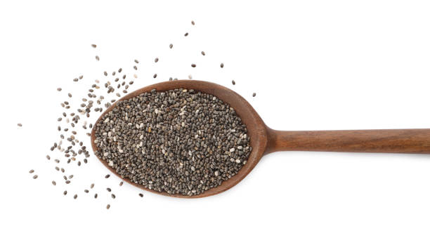 istock Wooden spoon with chia seeds on white background, top view 1311250697