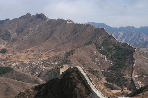 Great Wall of China flowing over a mountain range near Simatai