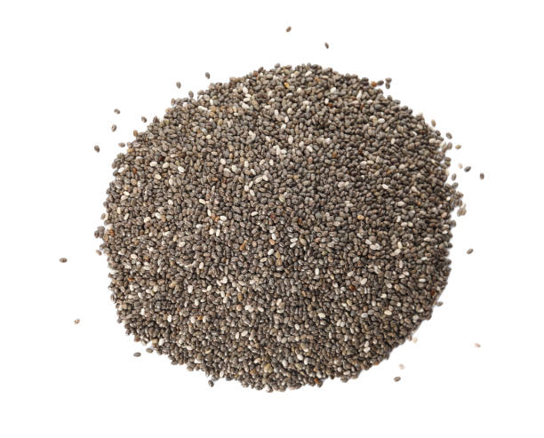 istock Pile of chia seeds on white background, top view 1311251675