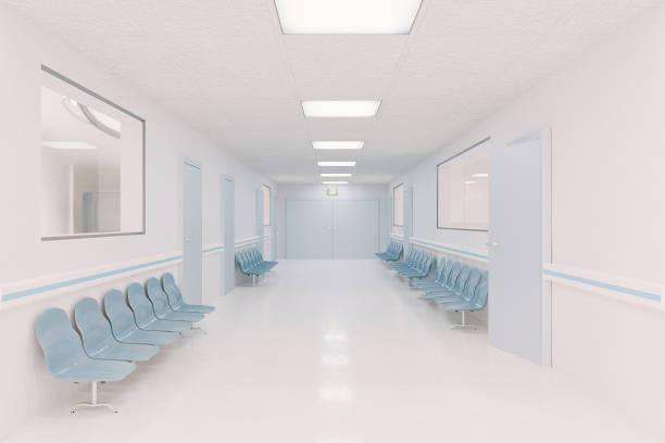 istock hospital corridor with waiting chairs on the sides 1311258728