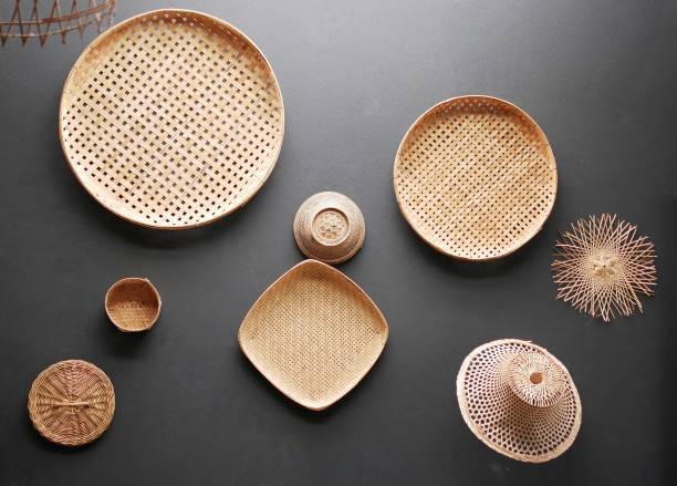 istock Wall decoration with old weave bamboo trays and bamboo hats. 1311264930