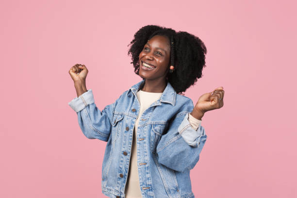 istock African-american woman portrait isolated on pink studio background with copyspace 1311265910