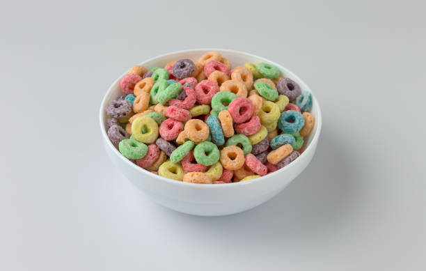 istock Dry sugar coated fruity flavored cereal in a bowl 1311266590