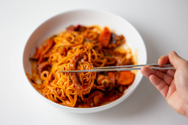 istock Spicy Squid Stir Fry with noodle 1311268312