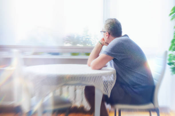 istock Single man suffers from loneliness 1311269390