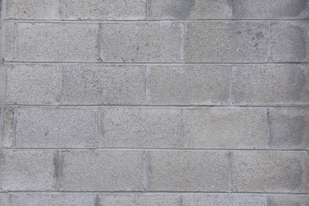 istock gray old ancient concrete brick wall Backgrounds. 1311271235