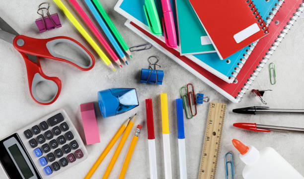 assortment of school supplies on a table - school supplies fotos imagens e fotografias de stock