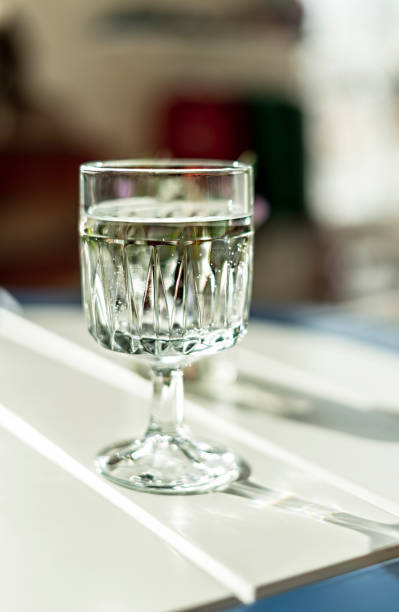 istock glass of mineral water on white table in sunlight 1311276308