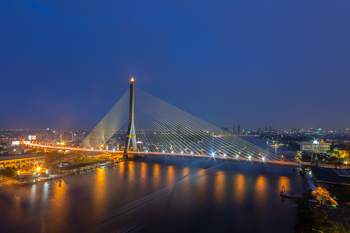 Rama VIII bridge in bangkok at twilight. Thailand beautiful bridge across the Chao Phraya river at dusk.