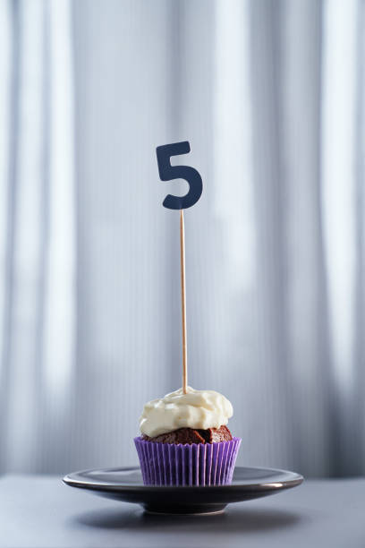 istock Digital gift card concept. Birthday cupcake with number 5 1311278030