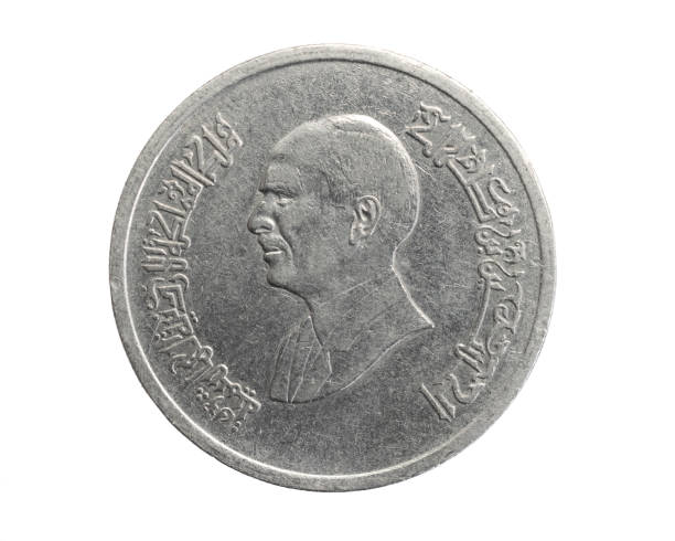 istock Jordan five piastres coin on a white isolated background 1311278850