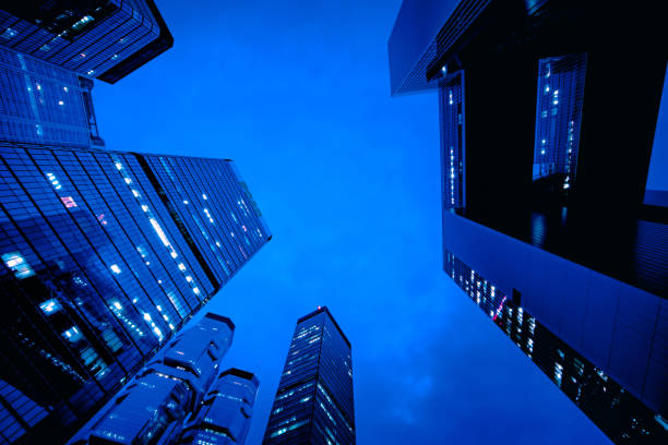 istock Modern office buildings in Hong Kong at night time 1311281772