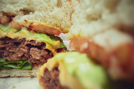 Giving an extremely close look at a tasty vegetarian burger ingredients.