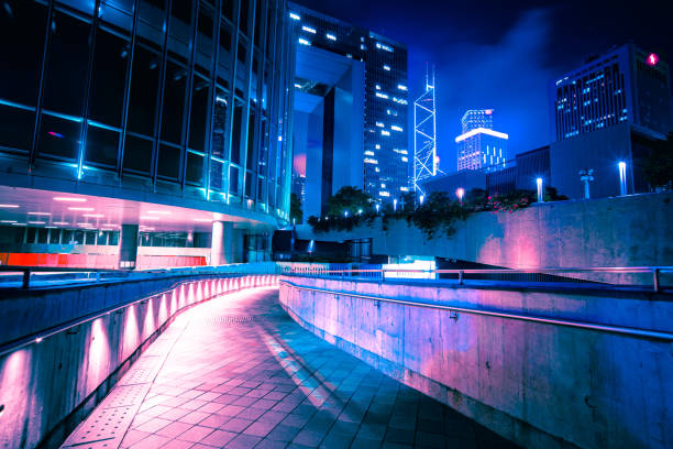 istock Modern office buildings in Hong Kong at night time 1311283823