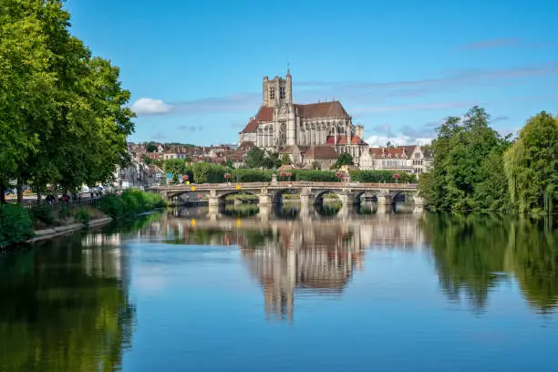 The Yonne river and the church of Auxerre in Burgundy, France