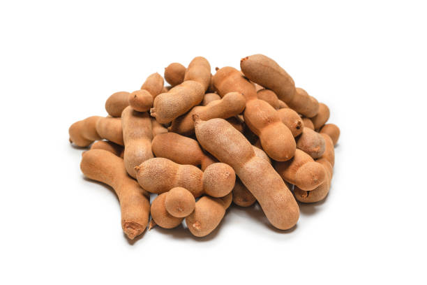 istock Sweet tamarind isolated on white background. 1311286737